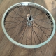 Blank Compound XL front wheel silver